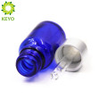 Envase de gotas de ojo del casquillo de la pipeta del oro de la botella de cristal del aceite esencial azul 10ml